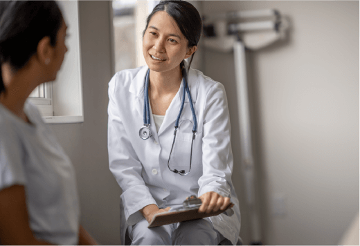 Doctor Speaking to Patient About AI in Surgery